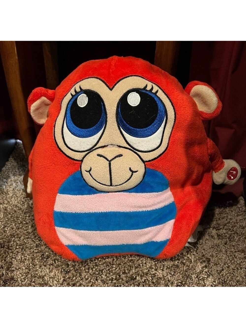 Stuffed money pillow that makes monkey sounds

CLEANED AND WASHED